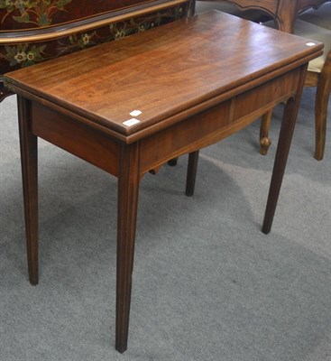 Lot 6341 - A 19th century mahogany fold-over tea table