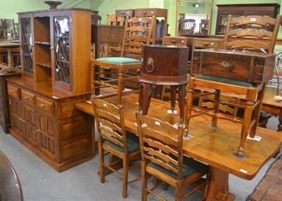 Lot 6346 - Modern country style dining room suite comprising refectory table, six ladder back chairs and a...