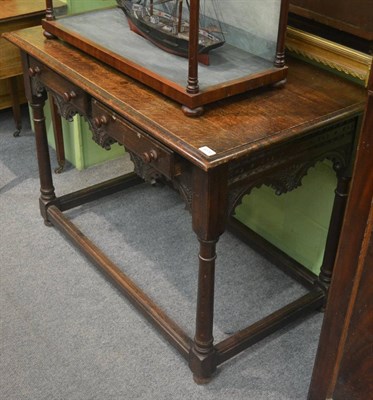 Lot 6370 - Carved oak side table