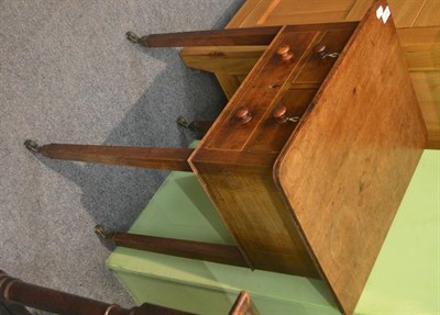 Lot 6371 - Early Victorian mahogany work table, the oblong top above an arrangement of drawers, two with ivory