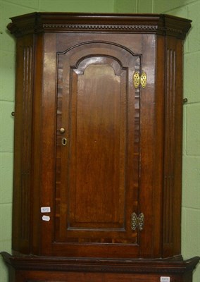 Lot 6372 - Georgian oak and mahogany crossbanded hanging corner cabinet