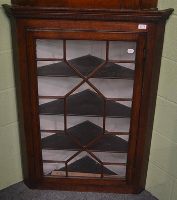 Lot 6373 - A 19th century oak corner cupboard