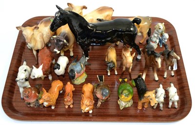 Lot 23 - A group of Beswick models, birds, dogs, lambs, cows, Wade Whimsies etc