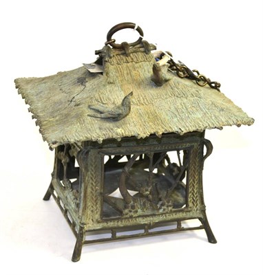 Lot 50 - Japanese bronze lantern decorated with blossom and birds, 23cm wide