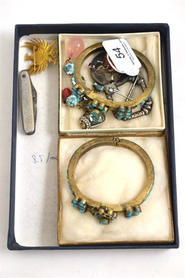 Lot 54 - A group of assorted jewellery including; a silver brooch, a Scottish hardstone brooch, a rose...