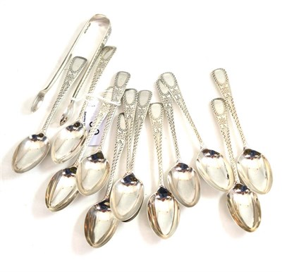 Lot 90 - A set of twelve silver teaspoons, London 1903, with bright cut decoration, together with...