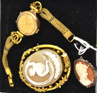 Lot 92 - A lady's 9ct gold wristwatch and two cameo brooches