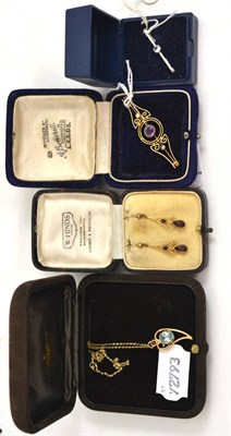 Lot 101 - An amethyst and seed pearl set brooch, a pair of amethyst earrings, a heart shaped pendant set with