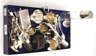 Lot 126 - A collection of silver and silver plate including assorted spoons, knife rest in the form of...