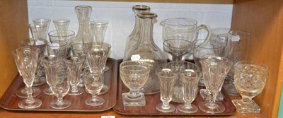 Lot 150 - A shelf of 19th century and later glass including rummers, carafes, flutes and other drinking...