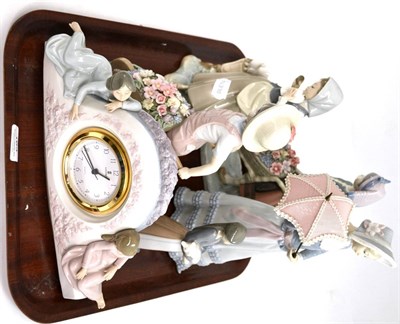 Lot 163 - A group of five Lladro figures and a Lladro clock