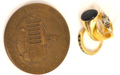 Lot 211 - A 22ct gold band ring, a signet ring with onyx seal, two dress rings and a bronze medallion