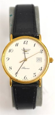 Lot 230 - A gold plated Longines wristwatch with box and booklets