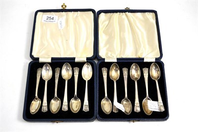 Lot 254 - Two sets of George V silver coffee spoons