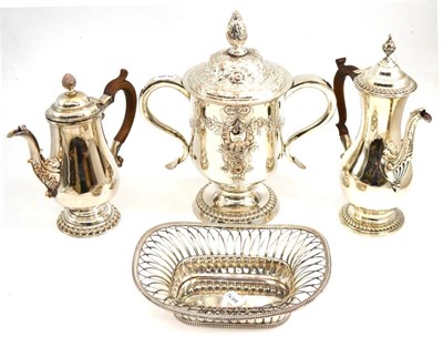 Lot 317 - Group of silver plate including coffee pots, baskets, trophy cup etc