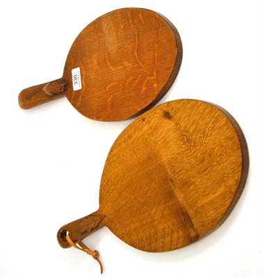 Lot 330 - A Robert ";Mouseman"; Thompson oak cheese board, with carved mouse signature on the handle,...