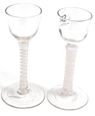 Lot 342 - Two late 18th century liqueur glasses with double series opaque twist stems