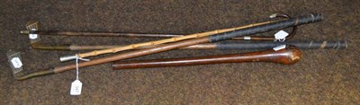 Lot 347 - Royal Flying Corps swagger stick, two brass head hickory putters, silver mounted cane and...