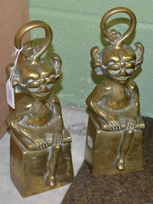 Lot 352 - Pair of 19th century brass door stops