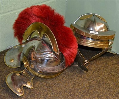 Lot 354 - Two reproduction Roman army helmets