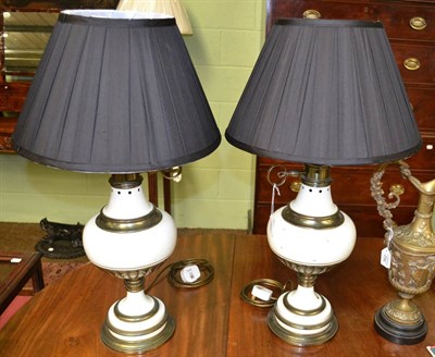 Lot 364 - Pair of brass lamps with painted decoration