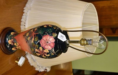 Lot 368 - Moorcroft Honeysuckle pattern pottery table lamp and shade