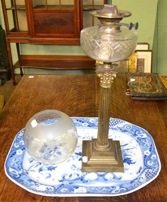 Lot 378 - Large blue and white platter and an oil lamp