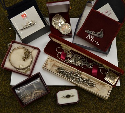 Lot 403 - A quantity of silver and white metal jewellery including, a bamboo bangle, a Victorian brooch,...