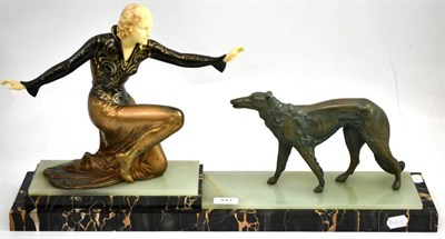 Lot 443 - 1920s Deco sculpture, lady and dog on marble and onyx base signed Roggia