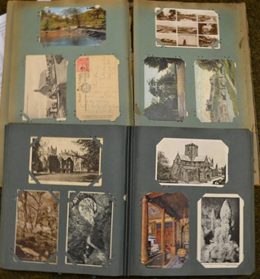 Lot 474 - Two albums containing postcards and two empty albums