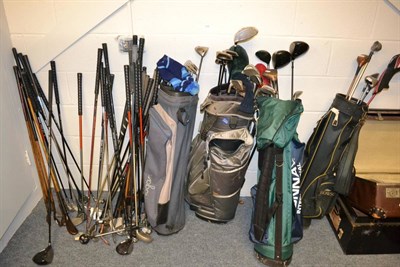 Lot 1005 - Large quantity of assorted golf clubs including four golf bags