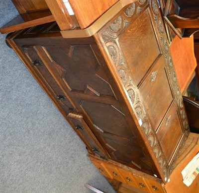 Lot 1029 - Early 20th century carved oak mule chest