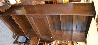 Lot 1035 - An oak bureau bookcase