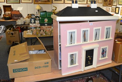 Lot 1068 - Modern doll's house painted in pink, doll's house furniture and a quantity of soft dolls