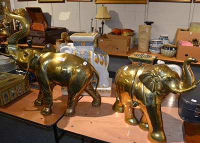 Lot 1081 - Two brass elephant models; an Indian elephant and African elephant