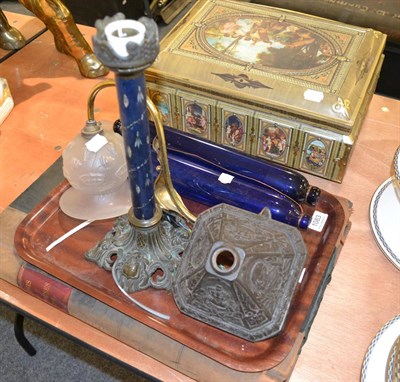 Lot 1083 - Large ledger, wall light, lamp, commemorative oil lamp base and two glass rolling pins