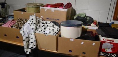 Lot 1101 - Eight boxes of assorted lengths of fabric, costume accessories, fancy dress items and two card...