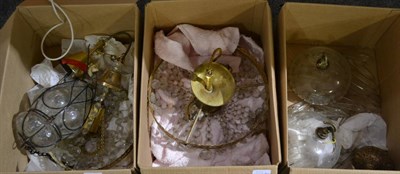 Lot 1114 - Large quantity of light fittings including brass, copper, lustre drop fittings, an oil lamp, etc