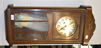 Lot 1144 - Oak wall clock