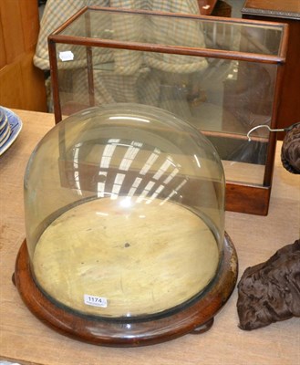 Lot 1174 - Early 20th century oak cased table top display case together with a glass dome display cover