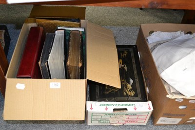 Lot 1182 - Quantity of postcards in various albums (in two boxes)