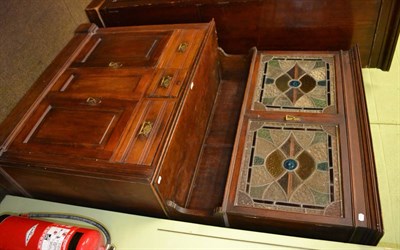 Lot 1302 - Late Victorian oak cupboard with leaded glass top