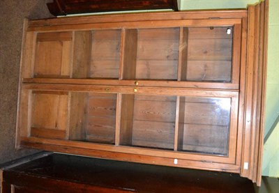 Lot 1304 - Late 19th century pine cabinet with glazed doors