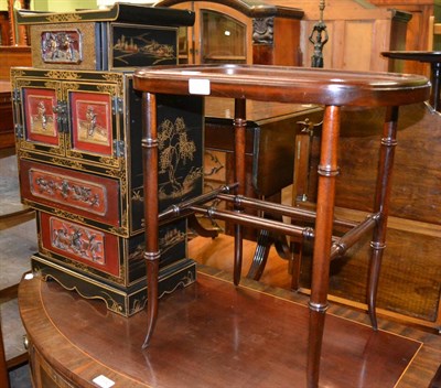 Lot 1333 - Ebonised and carved Chinese table cabinet and a reproduction mahogany oval stand