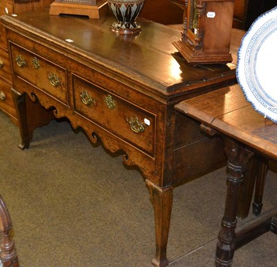 Lot 1366 - Late 18th century oak and mahogany crossbanded dresser base with two drawers