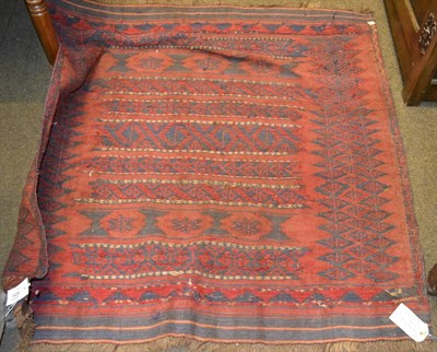 Lot 1426 - Balouch Soffreh Kilim, West Afghanistan, the madder field with bands of geometric motifs...