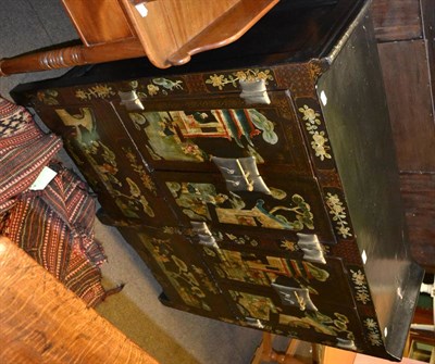 Lot 1429 - Japanese lacquered cabinet with two panel doors enclosing various shelves