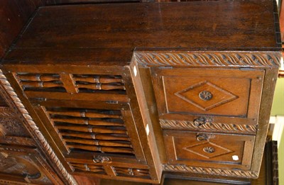 Lot 1433 - Hanging carved oak food cabinet with two cupboard doors