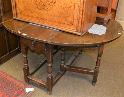 Lot 1437 - Oak gateleg dining table