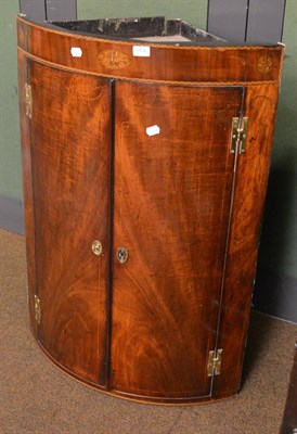 Lot 1456 - Georgian mahogany bow front and inlaid corner cabinet